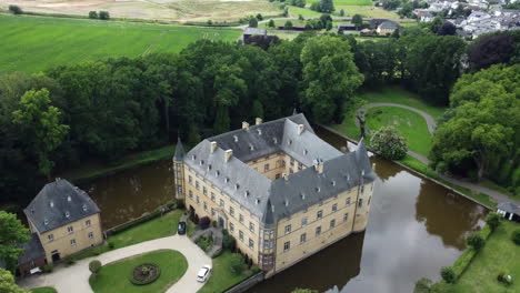 aerial view of a moated castle