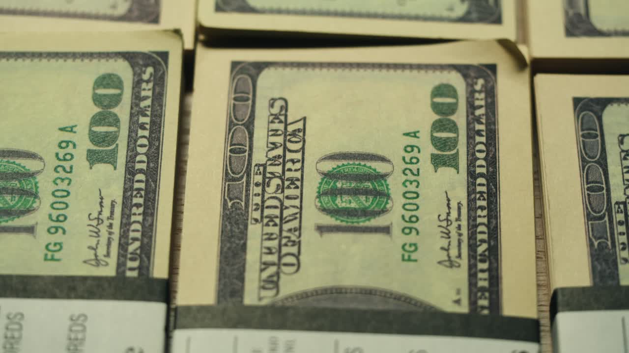 Stacks of cash dollars and euro, Banknotes counting, Specialised police officer Counting dollar euro banknotes in crime lab with machine, cashed out money, bitcoin changing, buying home flat in bank.