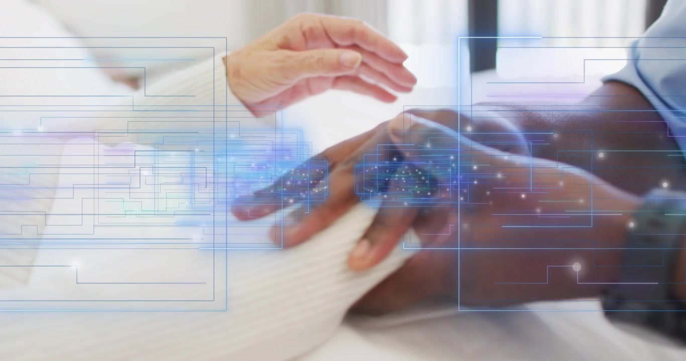Caregiver reaching down cupping patient hand, overlay tracing circuits signaling health support