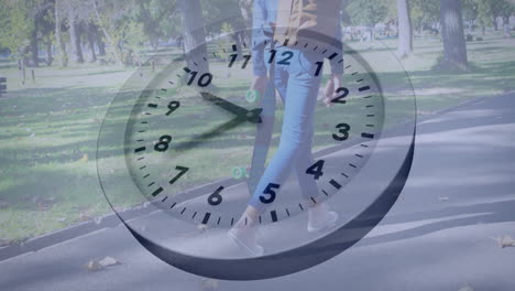 clock face animation over person walking in park on sunny day