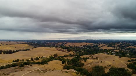 Time-Lapse-of-Mysterious-Sky-Above-Hilly-Landscaping