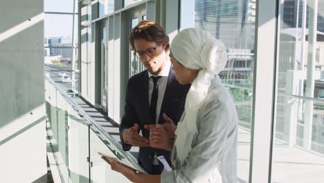 young business people talking in a modern office building