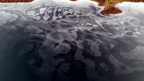 Aerial-View-Of-Boggy-Lake-Within-Cenas-Tirelis-Nature-Preserve-Near-Riga-In-Latvia