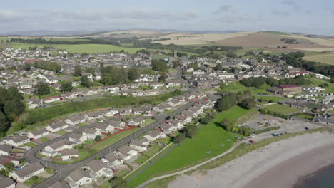 An-aerial-view-of-Inverbervie-looking-over-the-town-from-the-sea-on-a-sunny-summer's-day