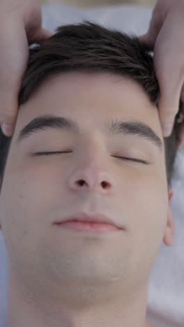 man enjoying a relaxing head massage
