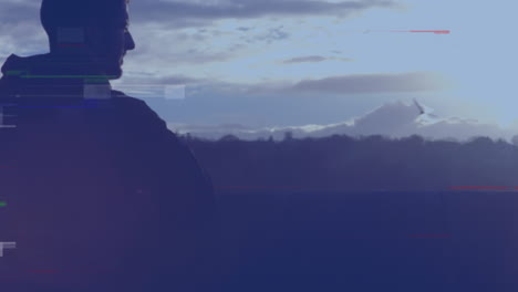 animación de glitch sobre hombre caucásico mirando el atardecer