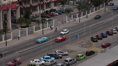 street scene with vintage cars