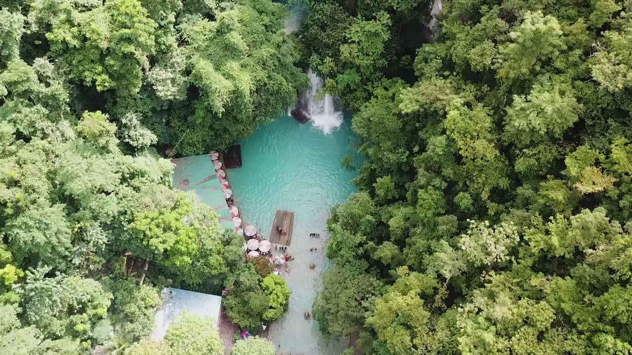 Aerial View of Hidden Waterfall, Natural Pool and Lagoon Deep in Tropical Jungle of Cebu Island, Philippines
