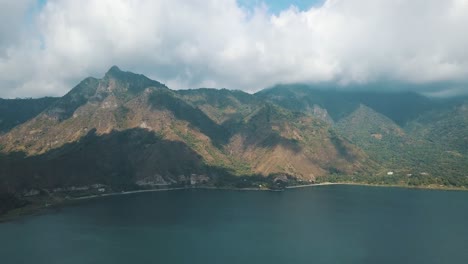 drone aerial view of "nariz del indio", indian nose in famous lake atitlan, solola, guatemala