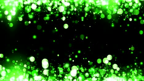 background with shiny green particles. glittering particles. beautiful bokeh light background. green confetti shimmering with magical sparkling light. seamless loop