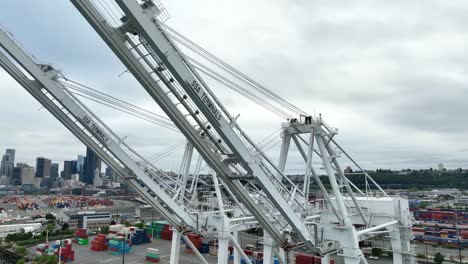 aerial view of shipping cranes in seattle on an overcast day