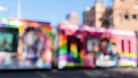 colorful trams passing iconic melbourne station