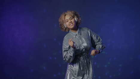 Woman Dancing in a Disco Dress