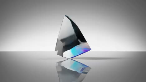 abstract geometric glass and crystal sculptures with reflections