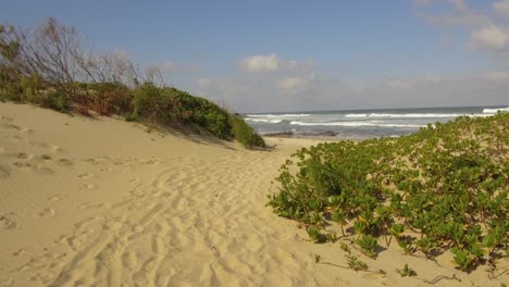 A-view-of-the-sea-from-between-two-sand-dunes