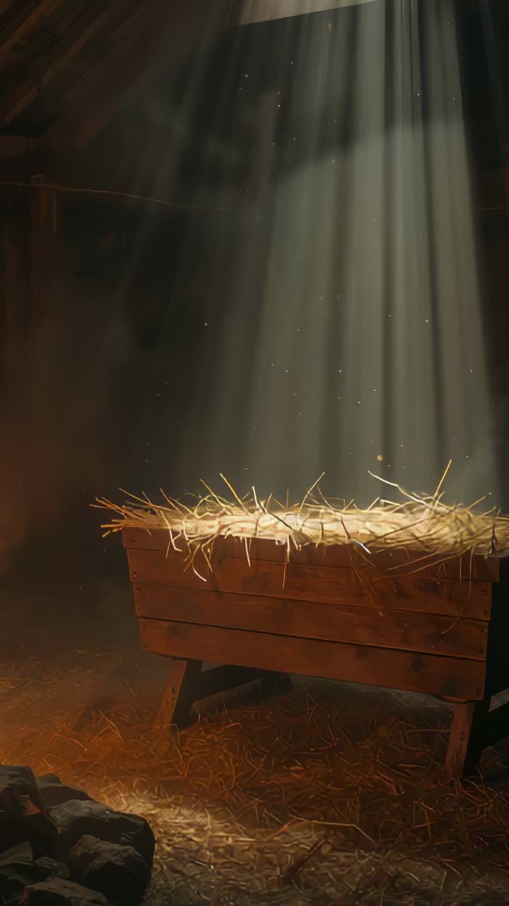 Vertical video: Streaming sunlight through roof gap, wooden manger catching dust over straw in barn