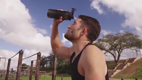 young adults training at an outdoor gym bootcamp