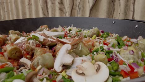 Slicing-and-dicing-mushrooms-adding-to-meal