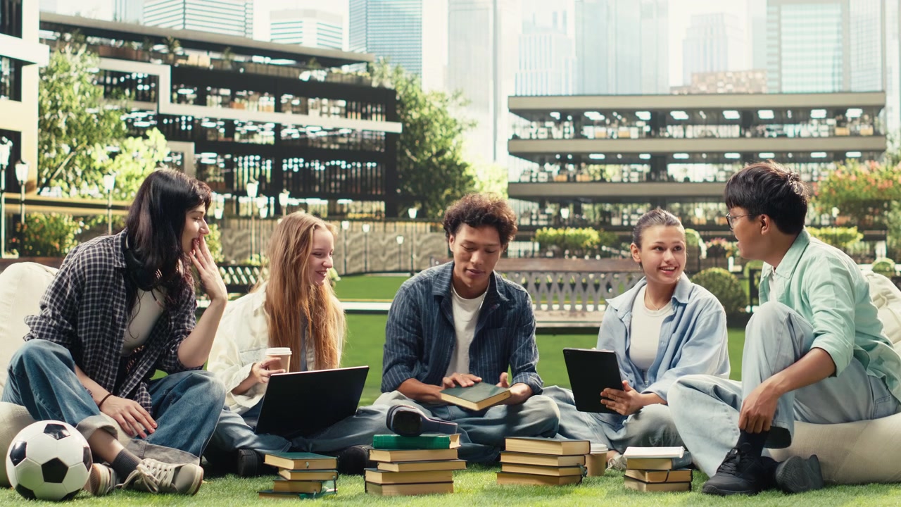 Woman student discussing project notes with diverse classmates near tablet