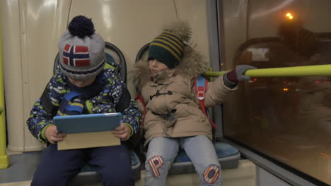 two young boys in a bus