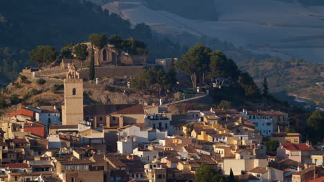 scene of polop town with houses and old landmarks spain