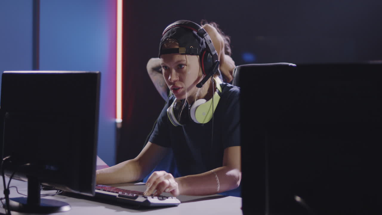 Woman Focused on a Video Game