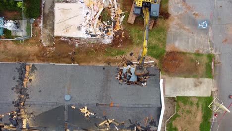 An-excavator-tearing-down-a-building