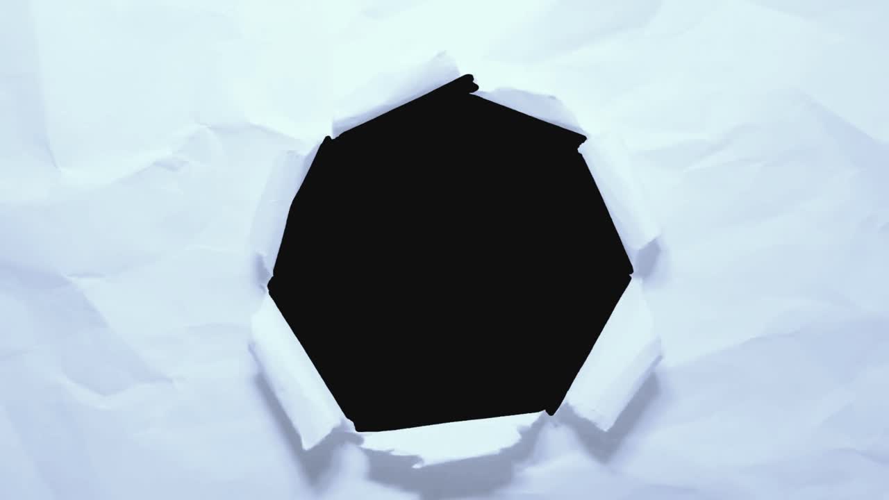 Tearing White Crumpled Paper Reveals Black Background