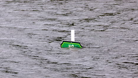 sign underwater from flooding from a tropical storm