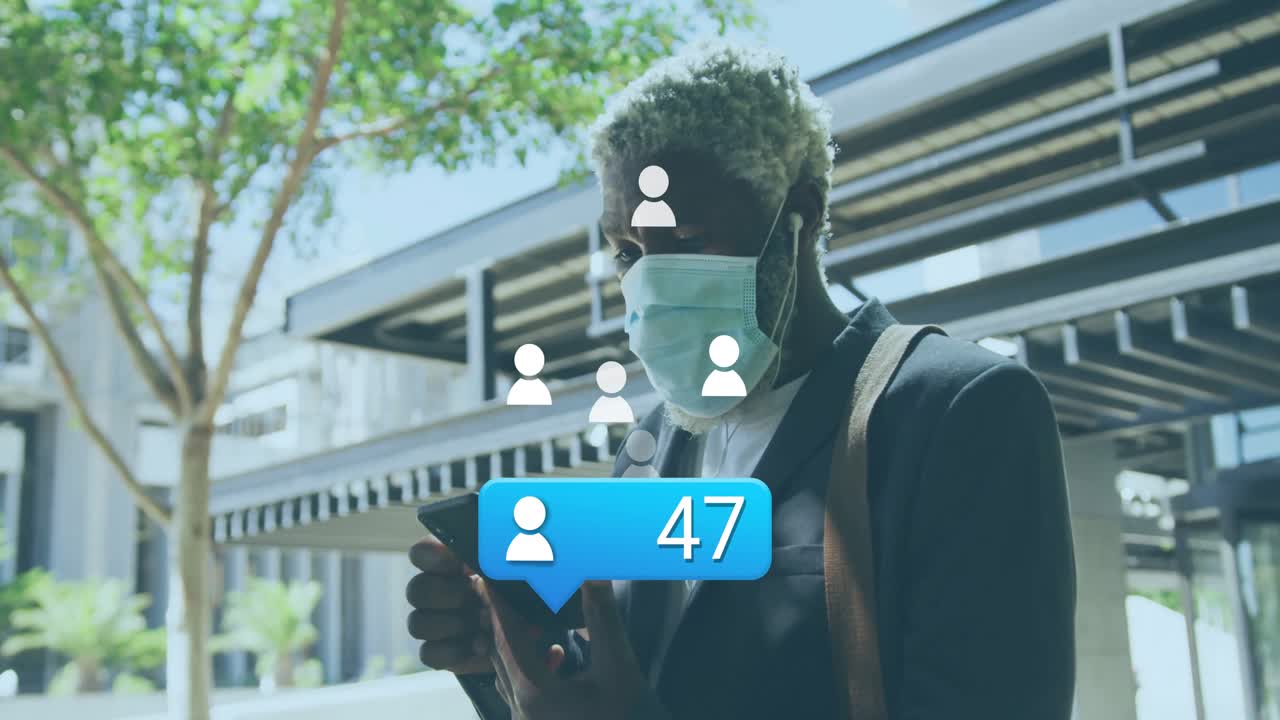 Mid adult man scanning smartphone with bubble rising follower count showing social media growth