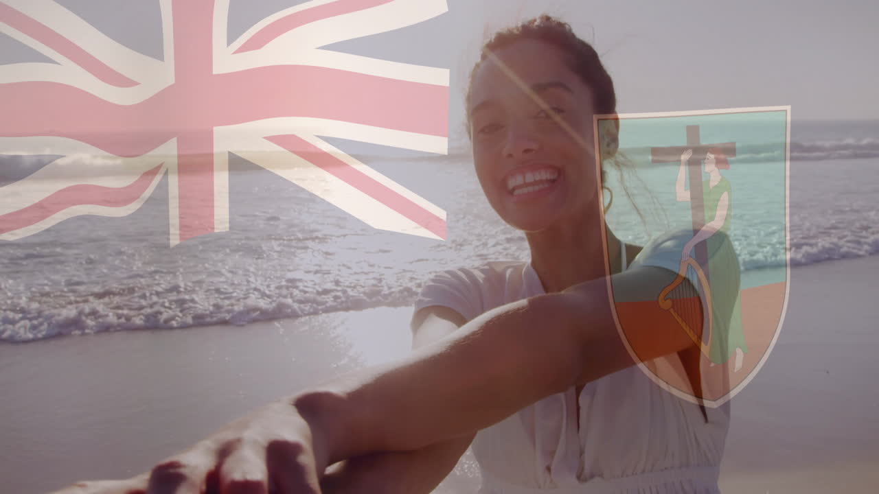 On beach, woman smiling with Montserrat flag animation overlay in sunlight
