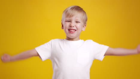 happy boy showing muscles