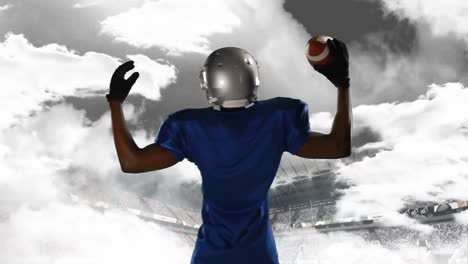 American-football-player-raising-his-arms