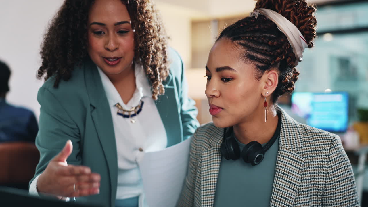 Businesswomen Collaborating in Modern Office