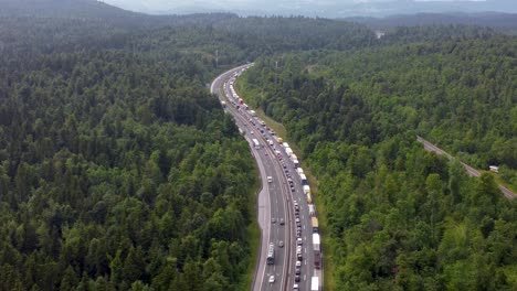 zoomed-in heavy traffic on european highway due to summer heavy traffic toward the coast consisting of cars trucks and rvs