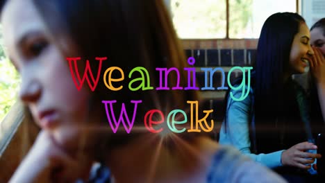 animation of weaning week text over sad caucasian girl and diverse colleagues laughing