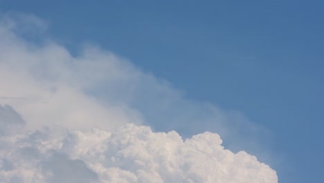 stunning cloud movement in blue sky, beautiful timelapse with white fluffy clouds