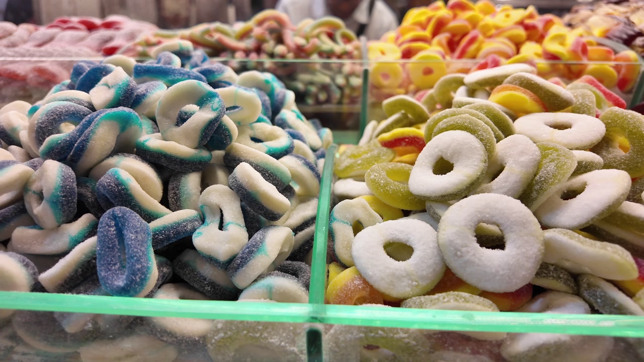 Close-Up of Vibrant Gummy Candies in a Candy Store