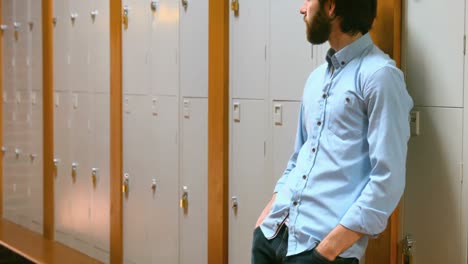 Student-leaning-against-the-lockers