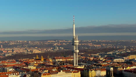 tv tower drone flight far warm light sky