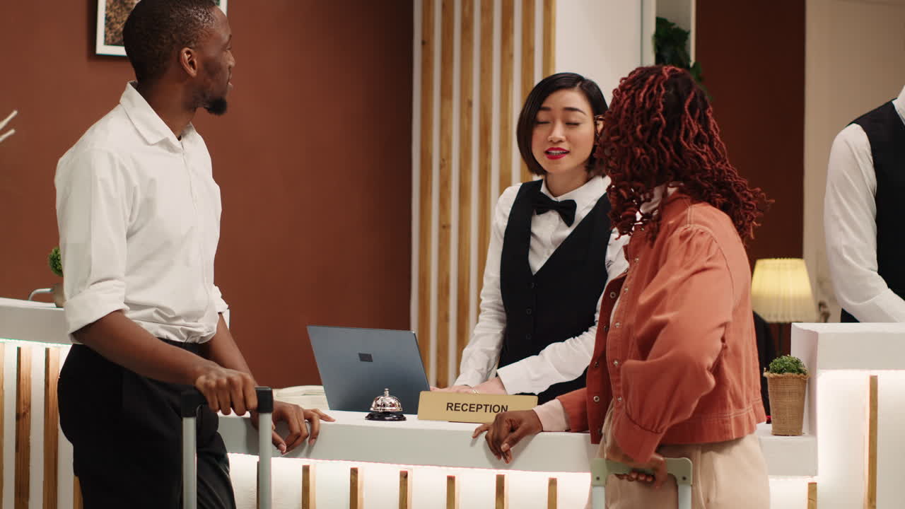 Receptionist presenting holiday package