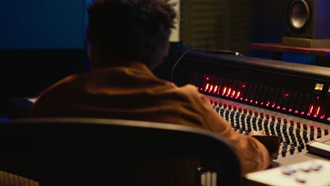 talented artist doing live performance with his guitar in professional studio