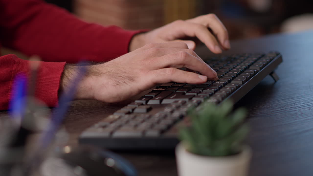 Office worker using business sales charts on computer