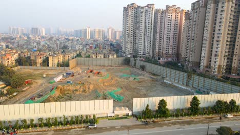 aerial drone shot capturing a massive construction site in noida india