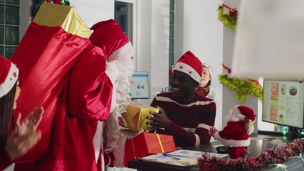 Christmas party in the office with Santa Claus