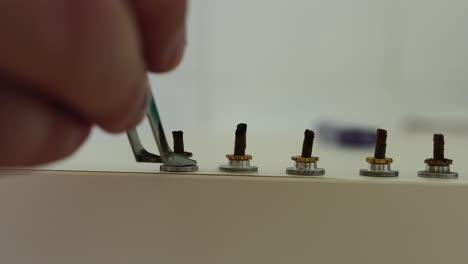 therapist performing moxibustion procedure at health center. moxibustion is a thermal effect on biologically active points located across the entire surface of the human body