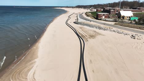 Muskegon's-famous-beach-undergoing-dredging-in-Spring