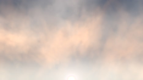 Sunny-sky-with-fluffy-clouds-and-bright-sun