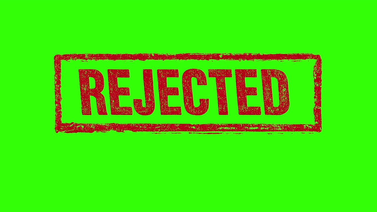 A realistic rectangular REJECTED rubber seal in deep red featuring an authentic distressed ink texture, worn edges, and natural imperfections for a genuine stamped appearance. 4K. Greenscreen