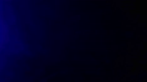 red and blue lights of the police flickering on black background